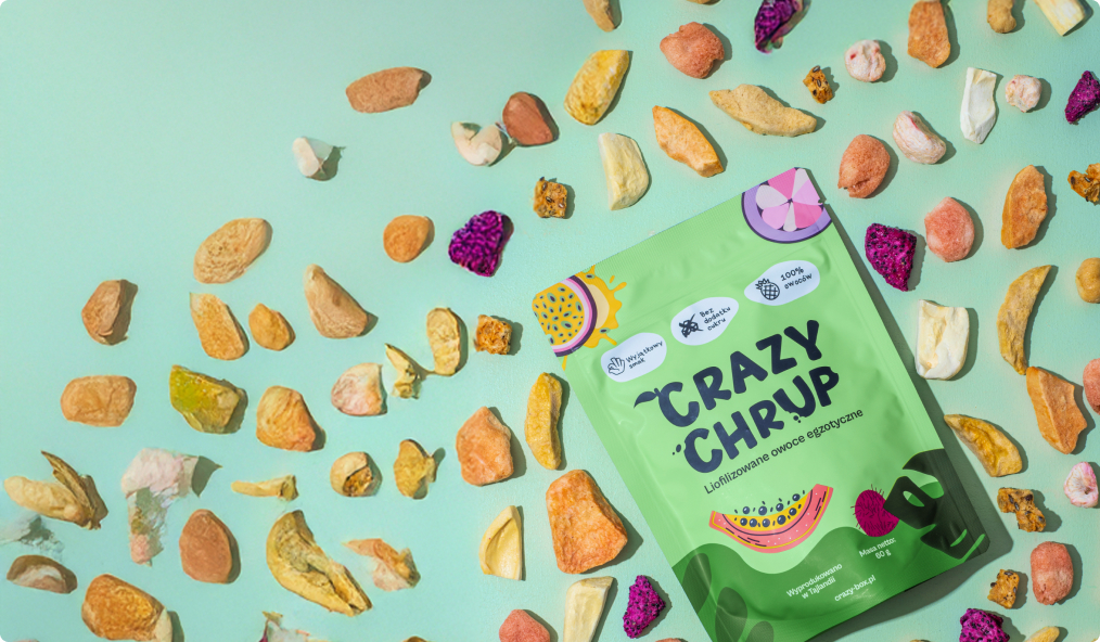 The Crazy Chrup pouch of freeze dried fruit, surrounded by scattered dried fruit slices